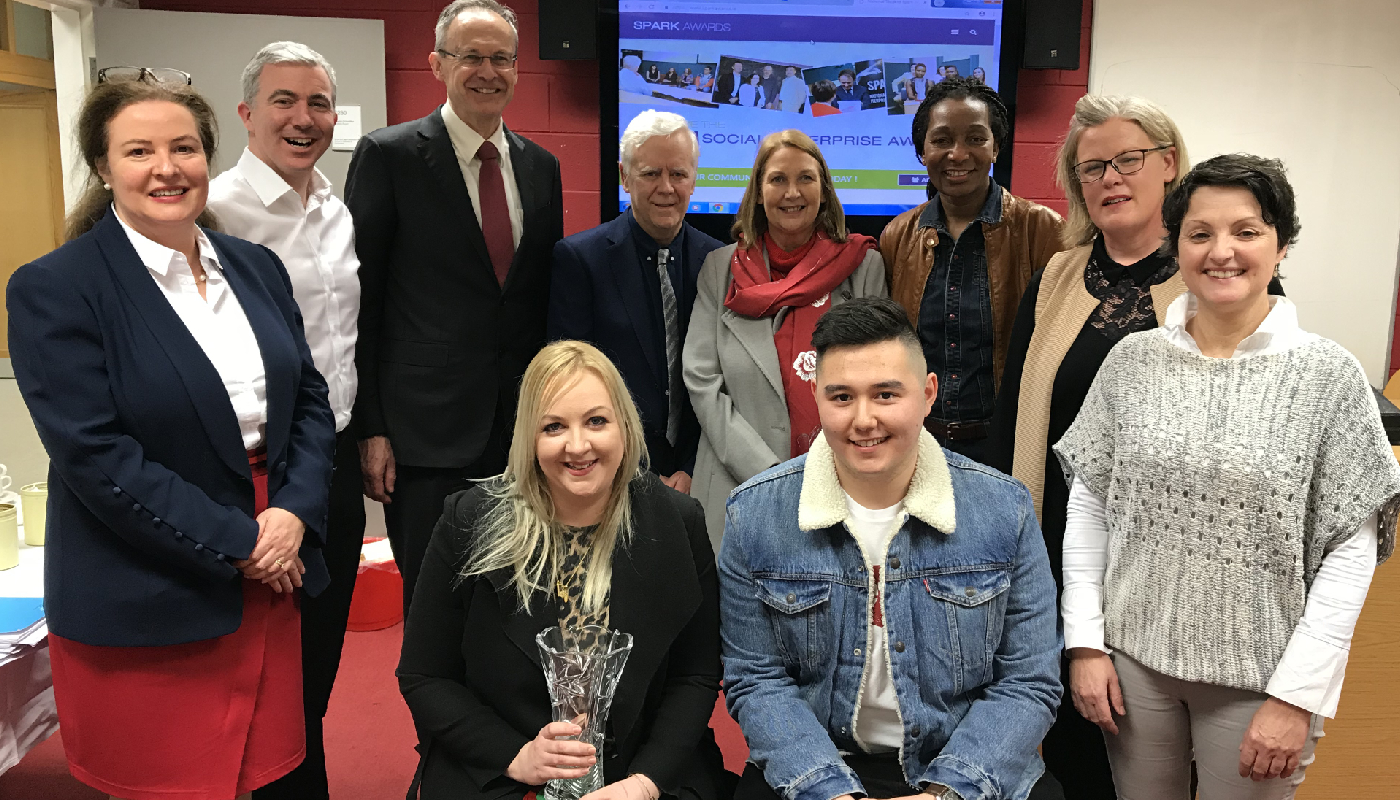 Front and centre, Dayna Branigan and Gareth Lau, showcasing their award with DkIT President Michael Mulvey, DkIT Lecturers from the School of Business and Humanities, as well as Dayna’s parents Desmond Branigan, Petria Branigan.